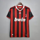 Camisa Retrô AC Milan 2009/10 Vermelha e Preta Versão Torcedor | Personalizável